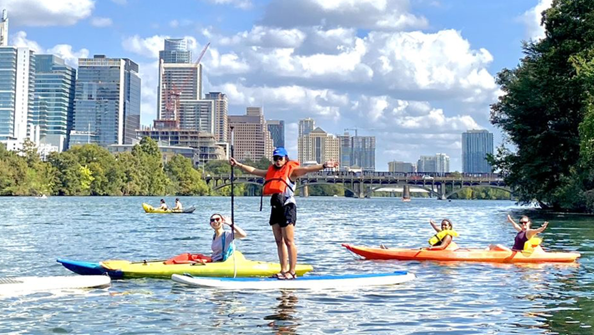 Four Family Medicine residents kayaking at Lady Bird Lake in Austin, Texas.