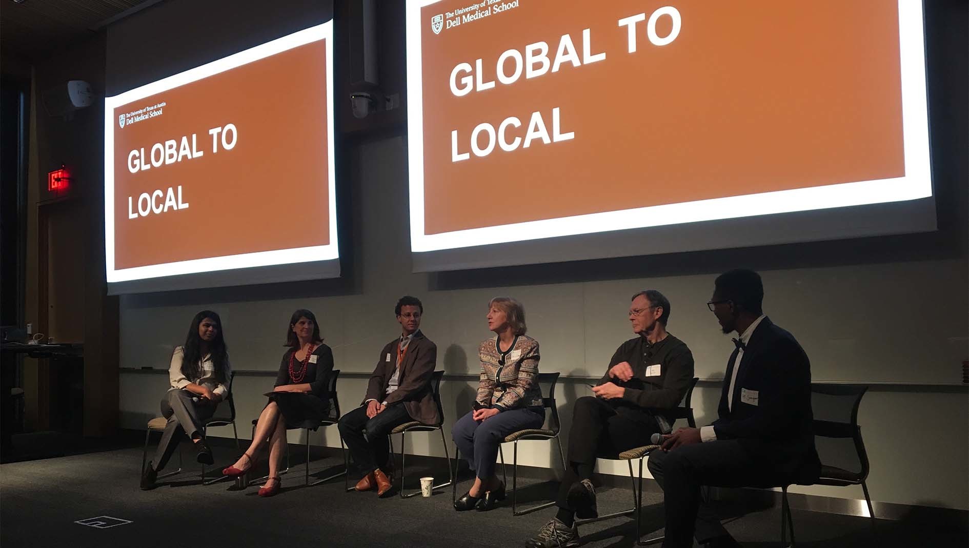 Members of the Division of Global Health sit as a panel for their Global to Local event.