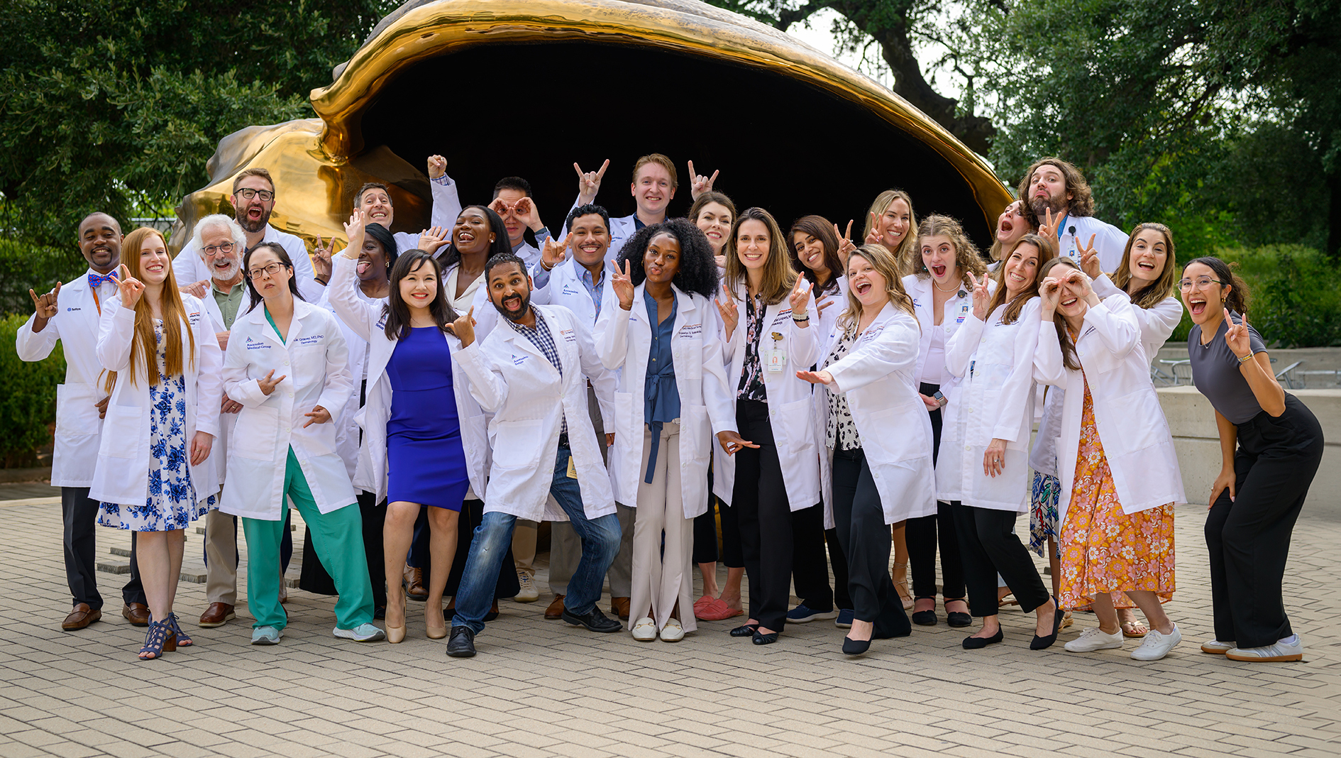 Funny group photo of all dermatology residents and faculty.