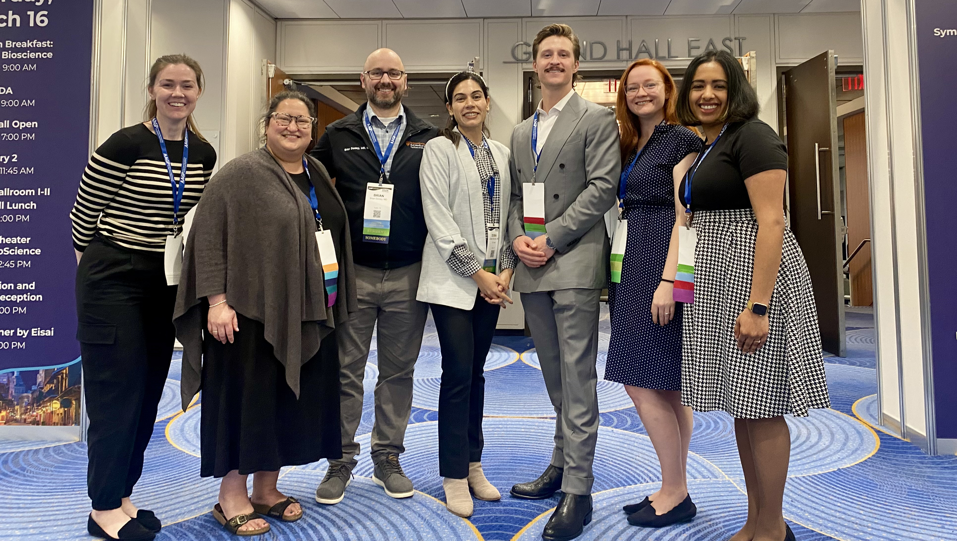 Group photo of geriatric psychiatry fellows, faculty and staff at a conference.