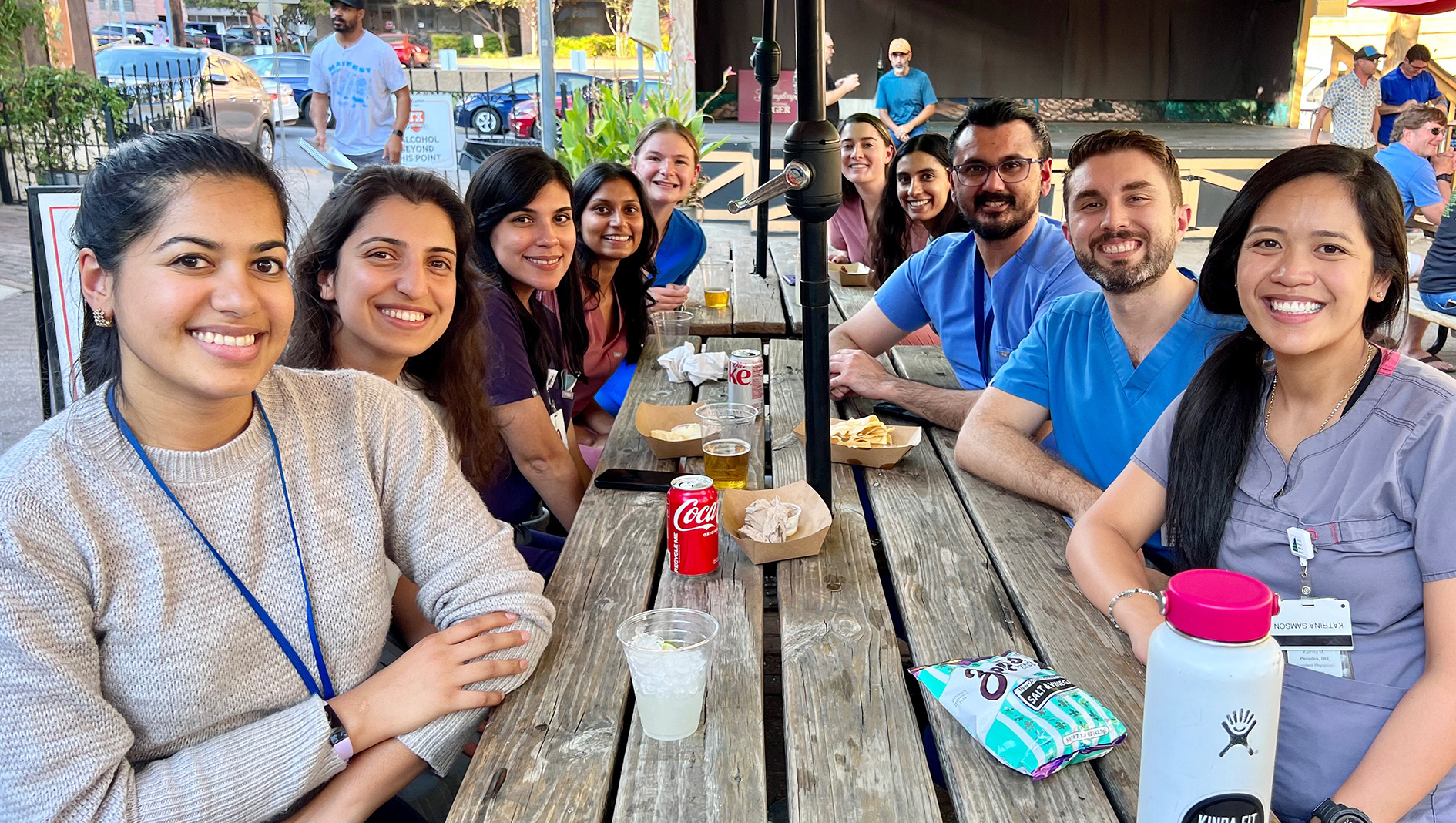 Neurology residents gather for happy hour.