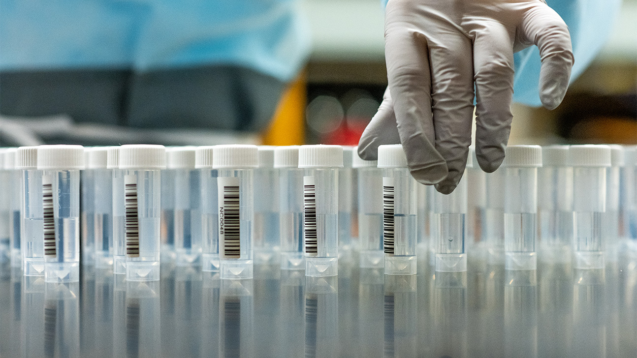 Scientists and engineers at the High Throughput Testing Core (HTTC) work in the lab on July 27, 2020 at The University of Texas at Austin. The HTTC uses liquid handling robots and quantitative PCR to test a high volume of samples for the novel corona virus.