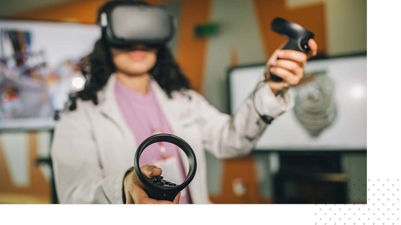 A medical student wears a virtual reality device for a medical education activity.