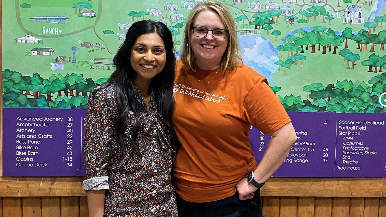 Priya Jacob and Keli Hawthorne stand together for a photo at Camp Oasis.