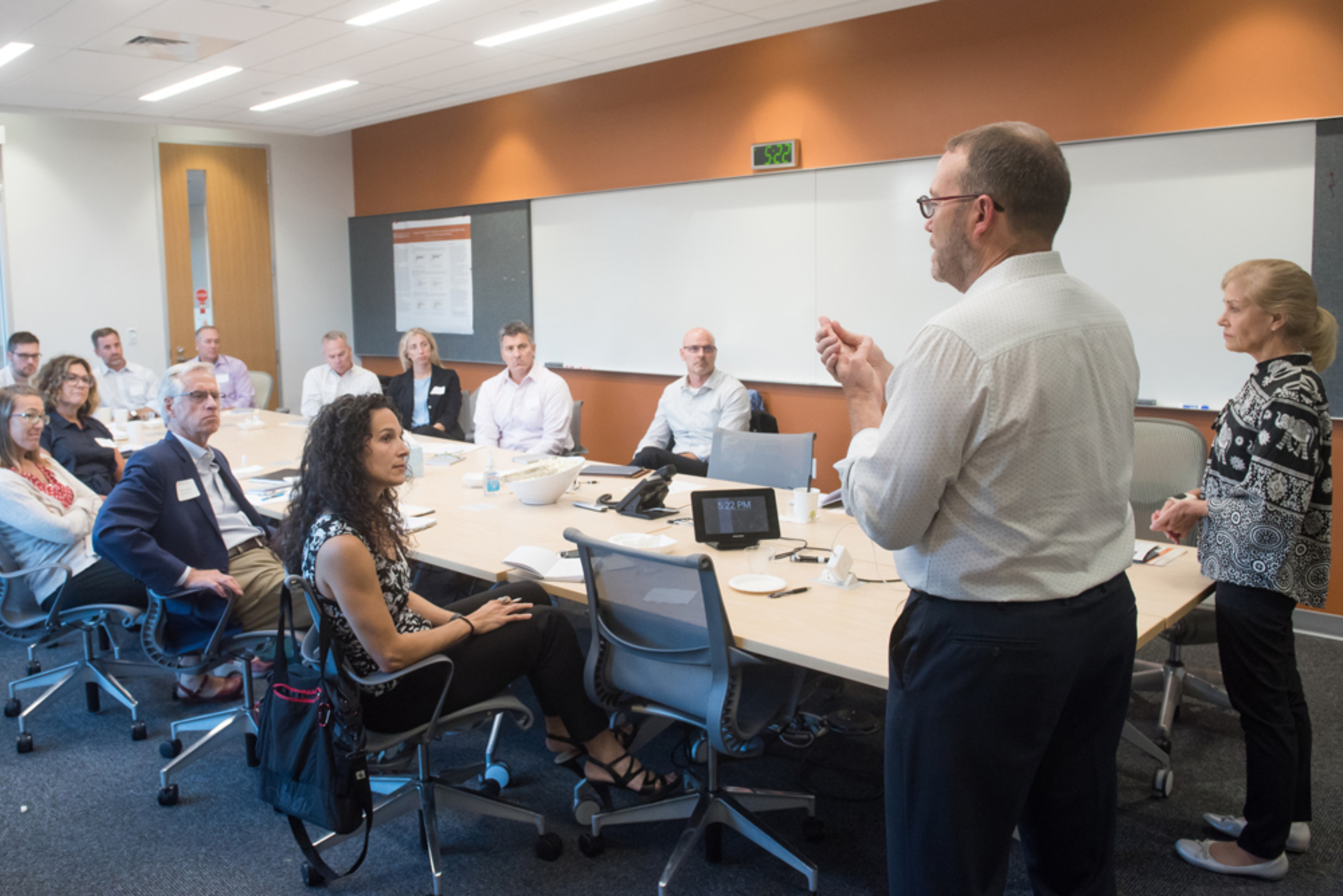 Elizabeth Teisberg and Scott Wallace present to a group during the Musculoskeletal Institute's Immersion Program in Value-Based Health Care.