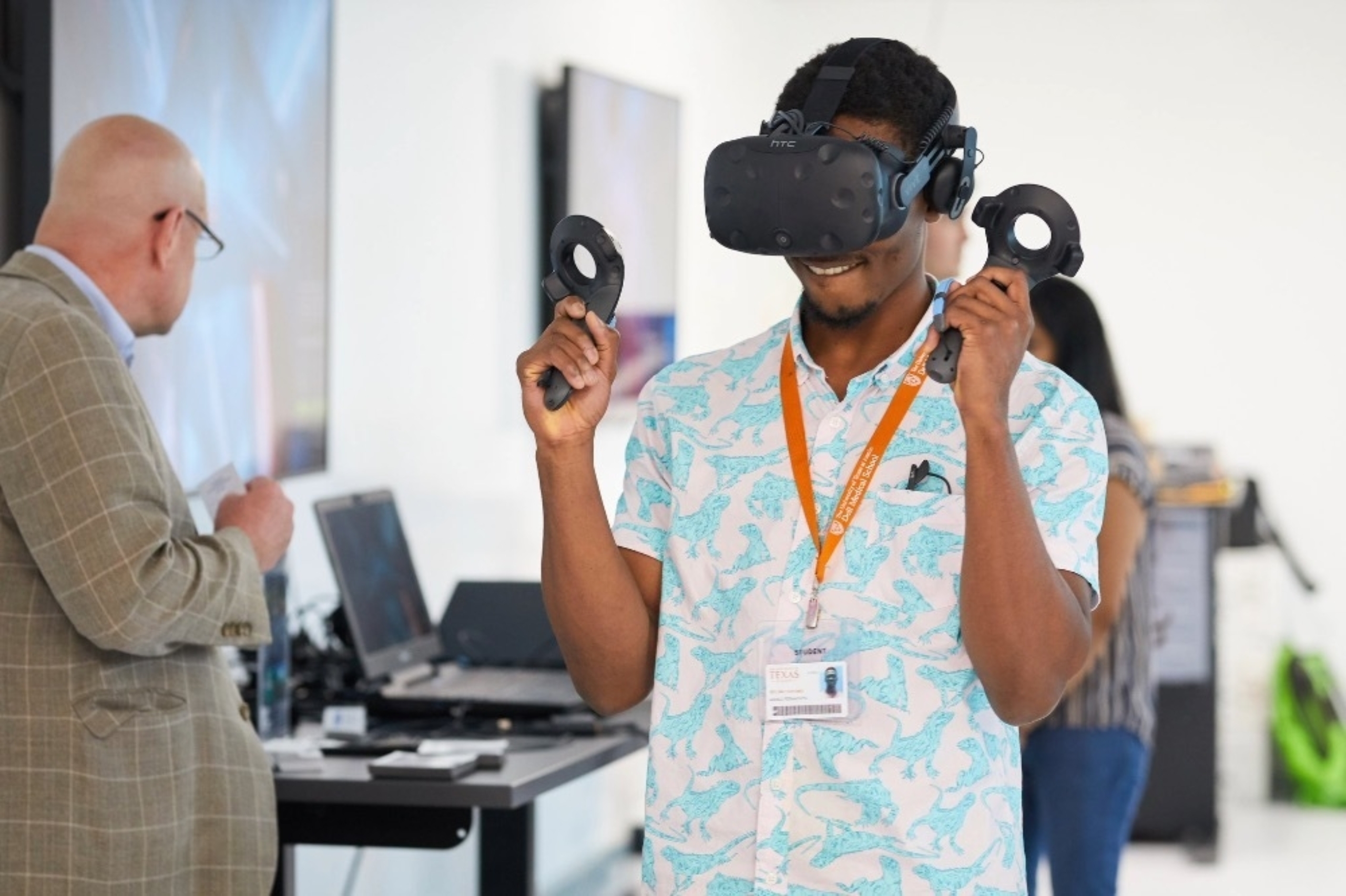 A young male adult participates in a VR experience at Dell Med.